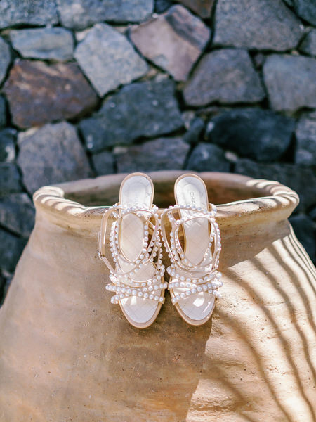 Pearl bridal sandals at Santorini destination wedding.
