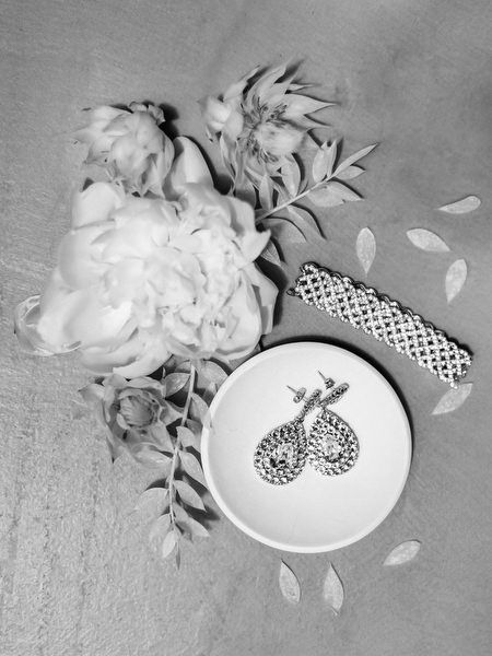 Wedding detail with pomegranate motif in Santorini Greece.