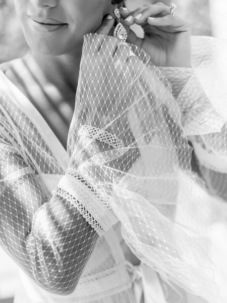 Editorial bridal detail at Santorini destination wedding.