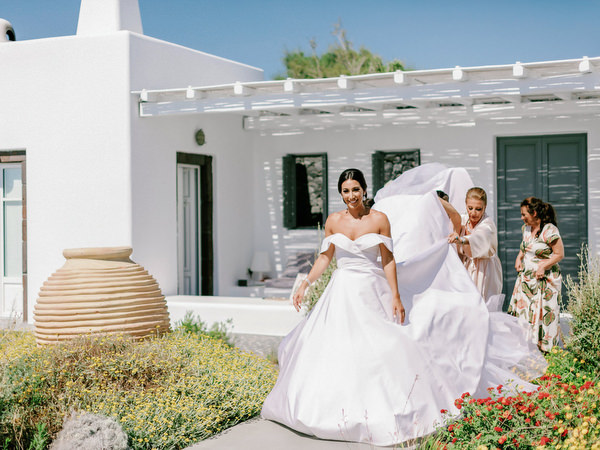 Luxury Santorini bridal portrait in Christian Siriano gown.