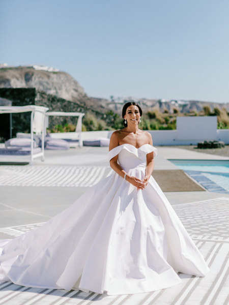 Bride portrait in custom couture gown Santorini Greece.