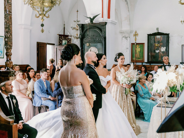 Orthodox church wedding ceremony in Santorini Greece.