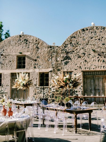 Arts Factory Santorini reception setup with pampas decor.