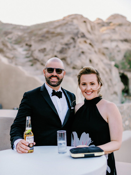 Guests enjoying drinks at Santorini wedding reception.