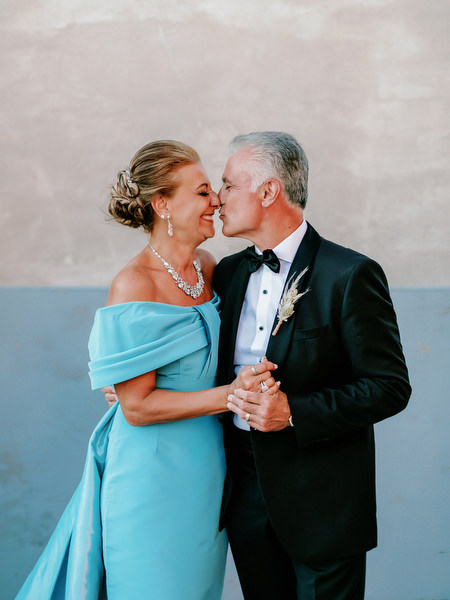 Parents portrait at Santorini destination wedding.