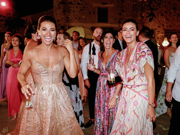 Bridesmaids dancing at Santorini wedding reception.