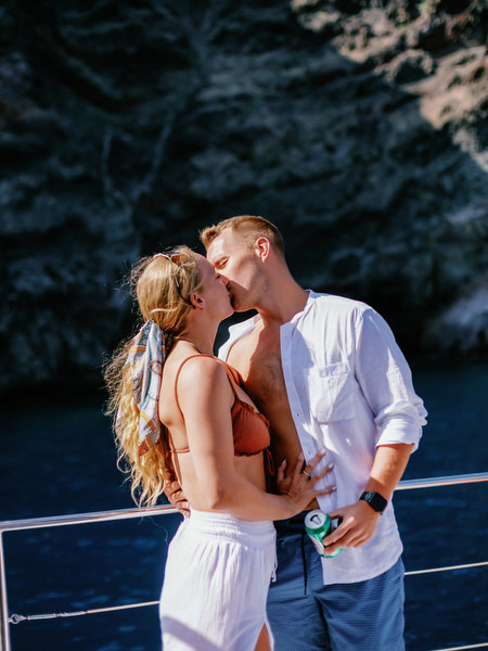 Couple portrait at Santorini harbor during wedding weekend cruise