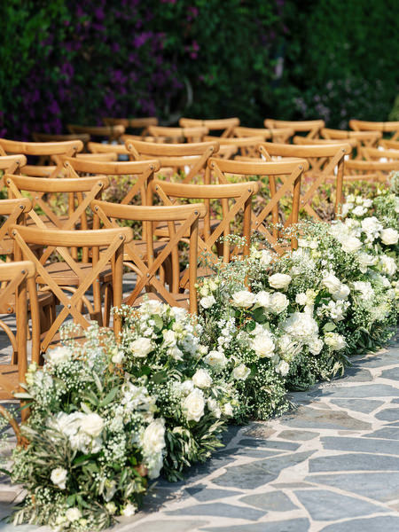 Floral aisle decor at Island Resort Athens Riviera ceremony.