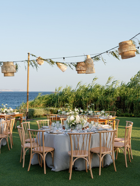 Outdoor reception tables at Island Resort Athens Riviera wedding.