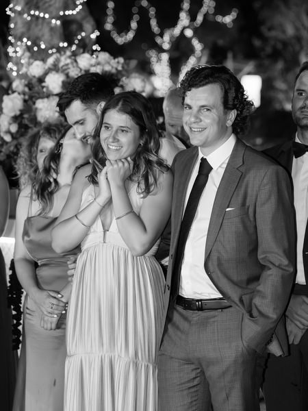 Wedding guests watching first dance at Athens Riviera wedding.