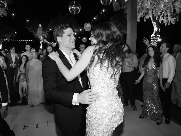 Bride and groom dancing at Island Resort Athens Riviera reception.