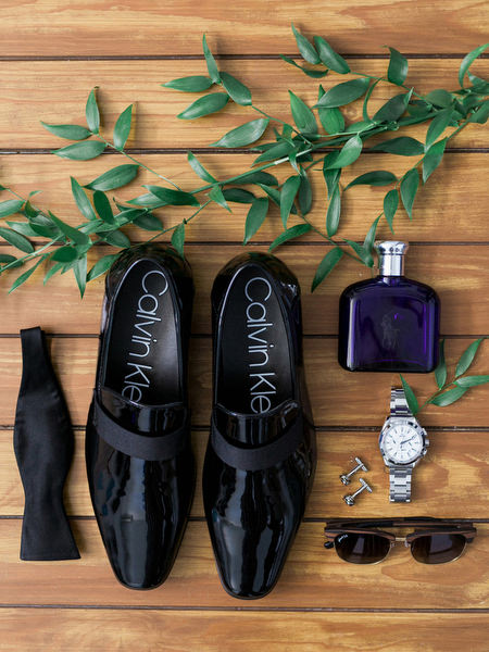 Groom shoes and details for luxury Santorini wedding at Venetsanos Winery.