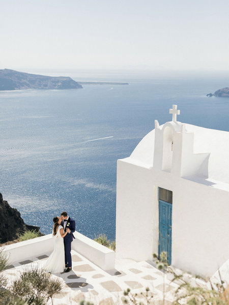 Santorini chapel portrait before wedding at Venetsanos Winery.