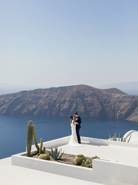 Santorini caldera wedding portrait near Venetsanos Winery.