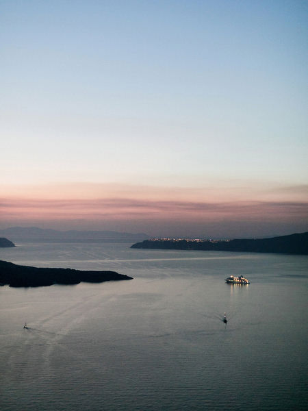 Santorini caldera sunset view during Venetsanos Winery wedding reception.