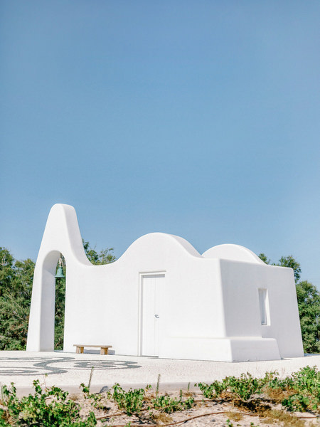 White chapel architecture at Eros Santorini during Santorini wedding welcome party