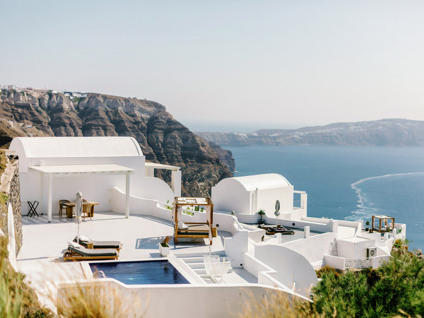 Outdoor wedding welcome party with sea view in Santorini