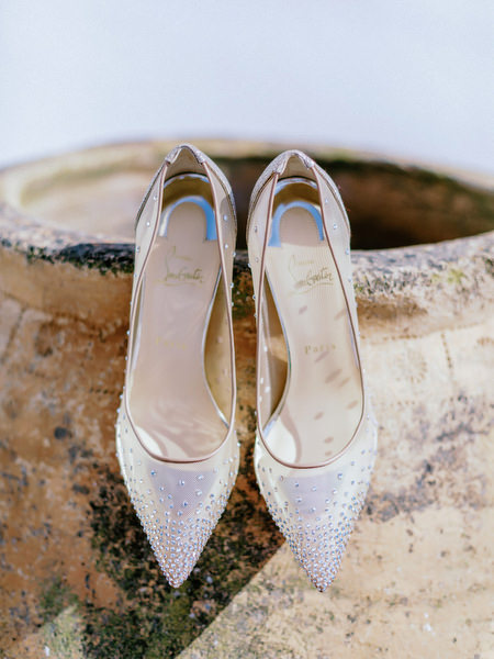 Champagne heels at Santorini wedding welcome party