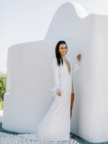 Bride portrait against minimalist white Santorini architecture