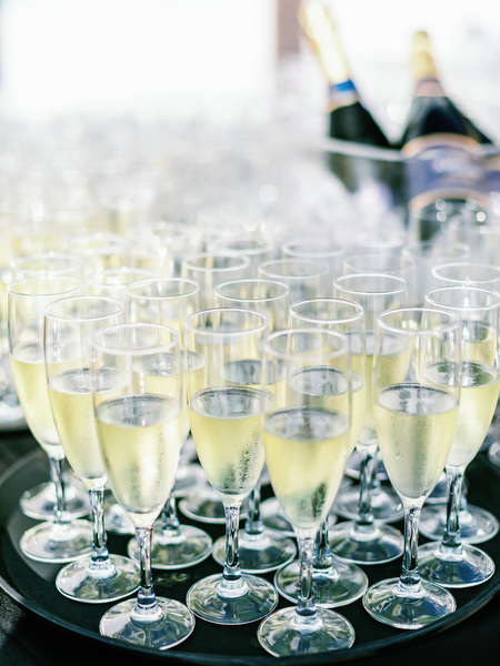 Champagne glasses served at Santorini wedding welcome event