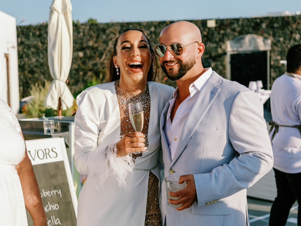 Couple celebrating together during destination wedding welcome party