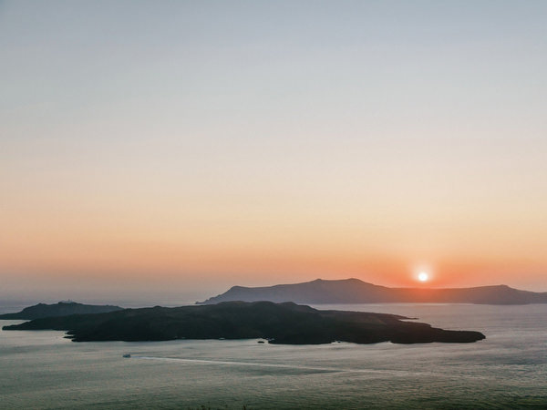 Santorini caldera sunset landscape during wedding welcome party