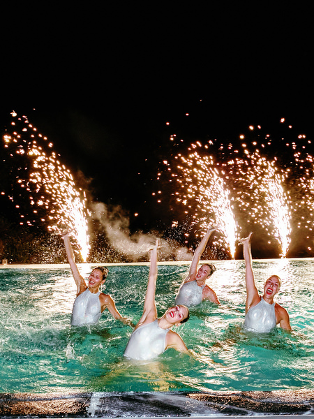 Water performance entertainment at Santorini wedding welcome party