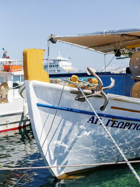 Antiparos pre-wedding boat cruise sailboat anchored in turquoise Cyclades waters