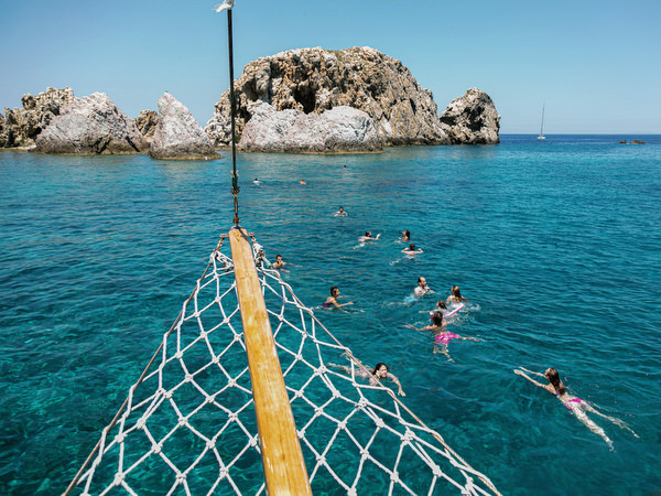 View from sailboat bow during Antiparos pre-wedding boat cruise in Greece