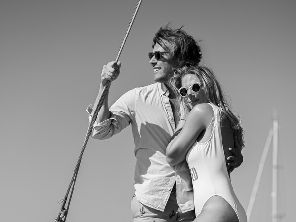 Couple laughing together during Antiparos pre-wedding cruise