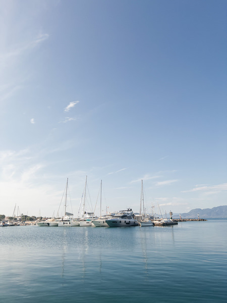 Calm Aegina harbor and marina on the morning of a Greek island wedding