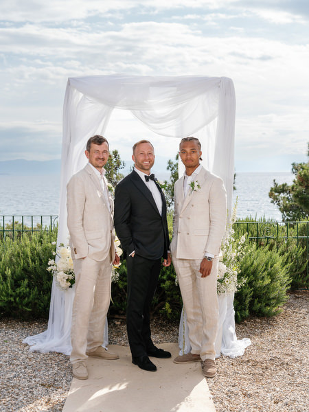 Groom posing with his groomsmen after the wedding ceremony at Pyrgos Ralli