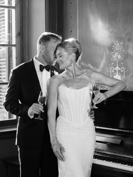 Black and white editorial portrait of the bride and groom inside Pyrgos Ralli