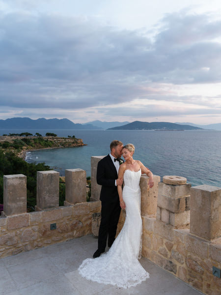 Bride and groom sharing a quiet moment during sunset portraits at Pyrgos Ralli