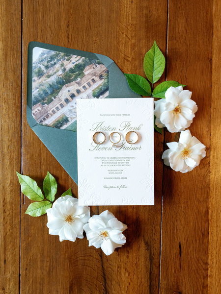 Wedding stationery suite with rings and floral details for an Athens destination wedding
