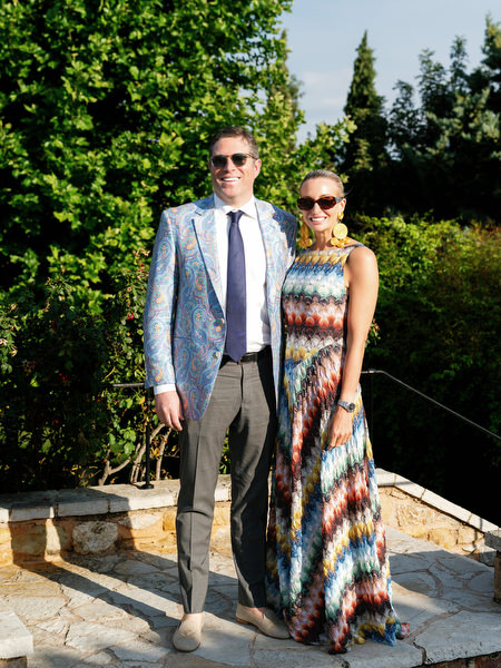 Wedding guests posing together during cocktail hour at Pyrgos Petreza